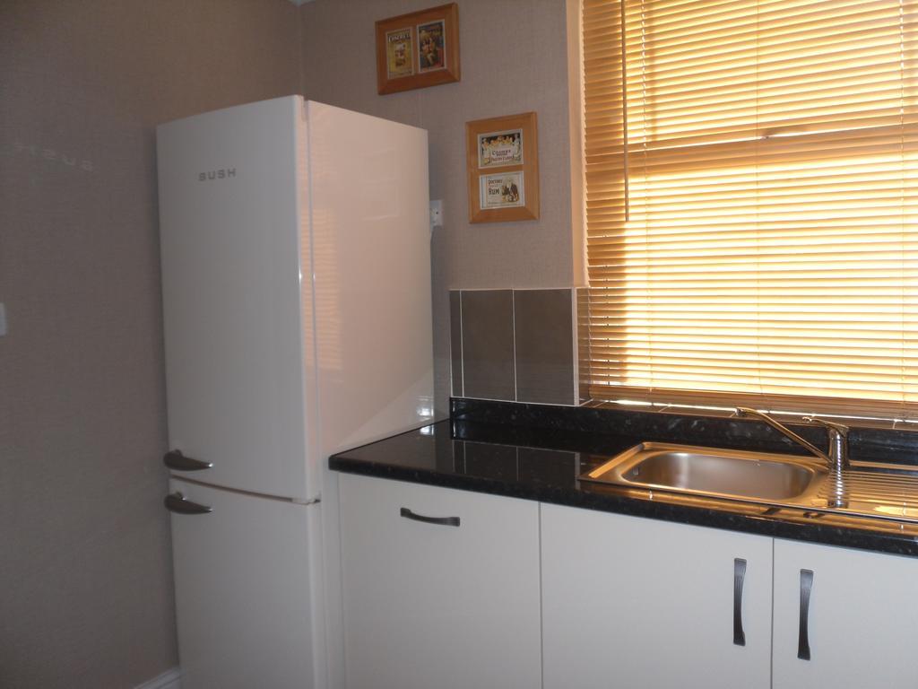 Claremont House Holiday Apartments Лландидно Номер фото